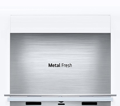 A diagonal view up into the top of the refrigerator showing the soft LED lighting.